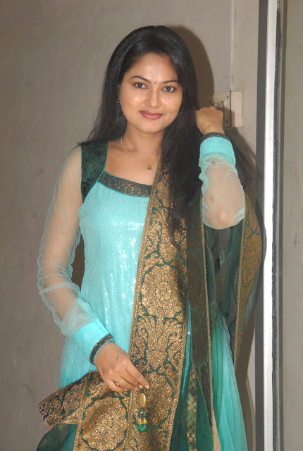 Telugu TV Actress Suhasini Long Hair Stills In Green Dress 9